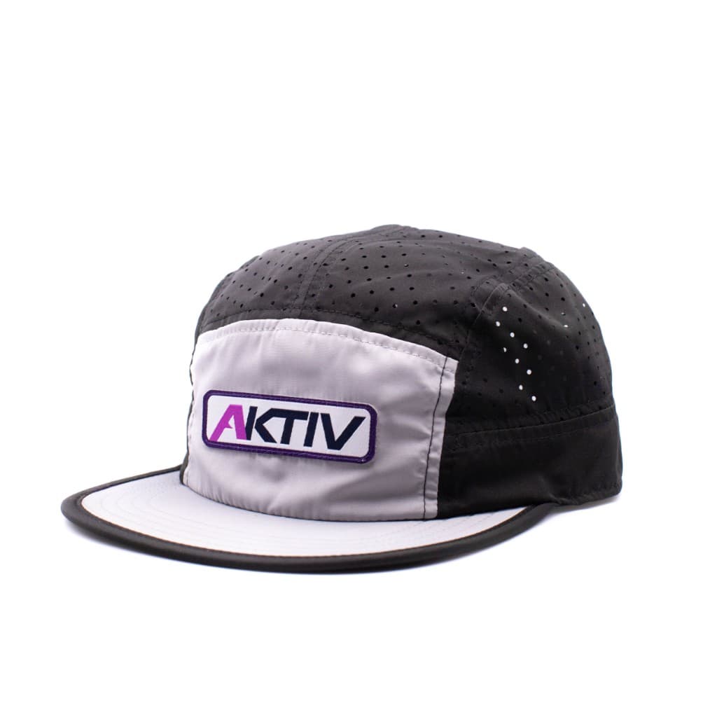AKTIV embroidered patch on a five-panel camper hat